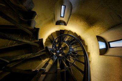 Low angle view of spiral staircase in building