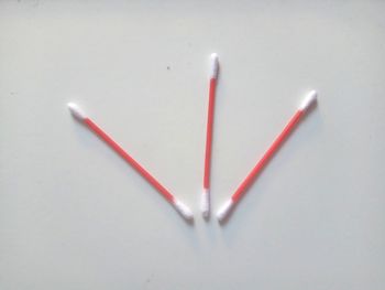 High angle view of colored pencils on white background