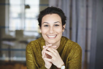 Portrait of a smiling young woman