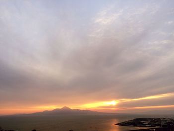 Scenic view of landscape against sky during sunset