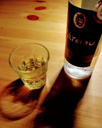 High angle view of beer in glass on table