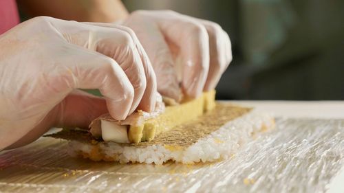 Midsection of woman preparing food