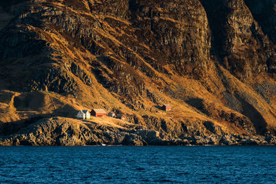 Scenic view of sea by rock formation