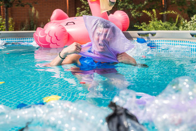 People swimming in pool