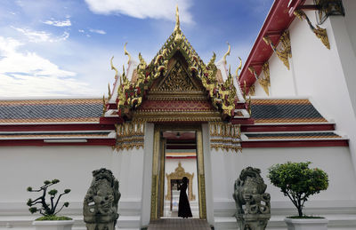 Statue of building against sky