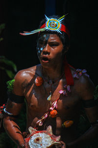 Portrait of young man looking away