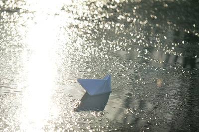 High angle view of raindrops on paper