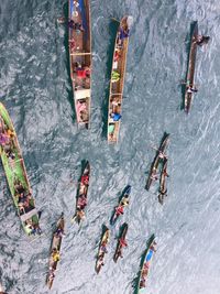 High angle view of people swimming in sea