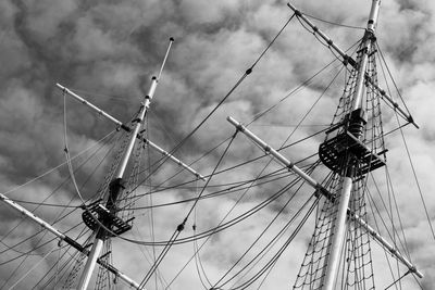 Low angle view of crane against sky