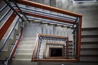 Directly above shot of spiral staircase in building