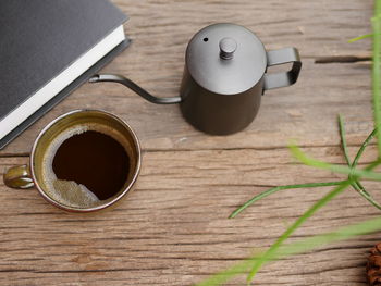 High angle view of coffee cup on table