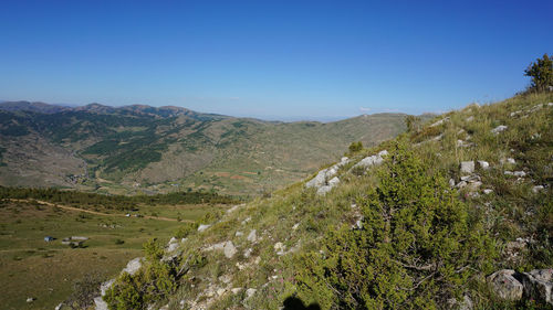 Scenic view of mountains against clear sky