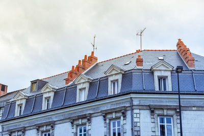 Dormer windows and roof of buildings in nantes, france