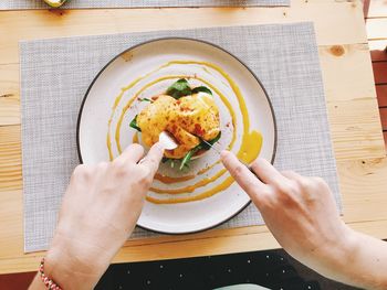 High angle view of person holding breakfast