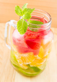 Close-up of lemon in glass on table