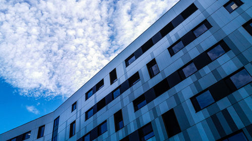 Low angle view of modern building against sky