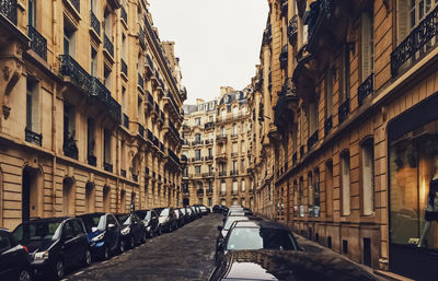 Canal amidst buildings in city