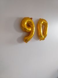 Close-up of birthday cake against white background