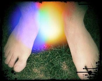 Woman standing on grass
