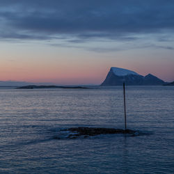 Scenic view of sea against sky at sunset