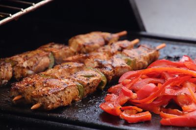 Close-up of meat on barbecue grill