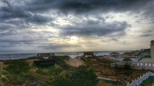 Scenic view of sea against cloudy sky