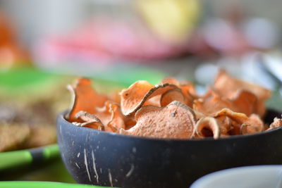 Close-up of bread in bowl on table