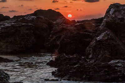 Scenic view of dramatic sky during sunset