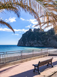 Scenic view of swimming pool by sea against sky