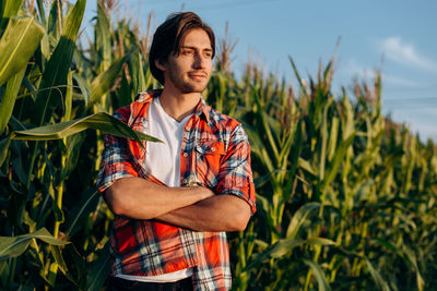 Young man standing on field