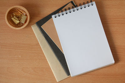 High angle view of blank book on table