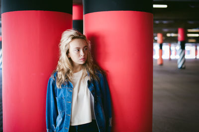 Woman standing in basement