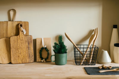 Scandinavian style kitchen utensils. wooden cutting boards, wooden spoons and shovels. 
