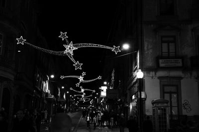 Illuminated street light at night