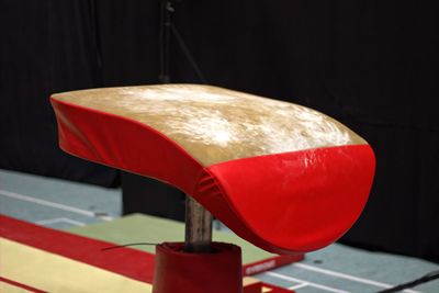 Close-up of red umbrella on table