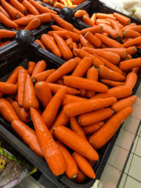 Close-up of carrots for sale at market stall