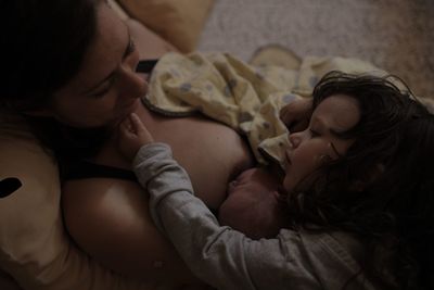 Midsection of woman lying down