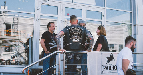 Group of people standing in front of building