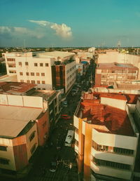 High angle view of buildings in city against sky