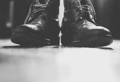 Low section of person sitting on floor