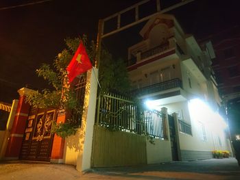 Low angle view of illuminated buildings at night