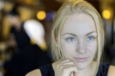 Close-up portrait of young woman