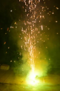 Close-up of firework display at night