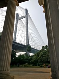 View of suspension bridge in city