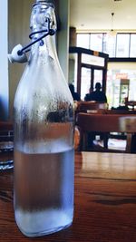 Close-up of beer glass on table