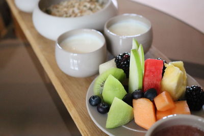 Close-up of fruits in bowl on table