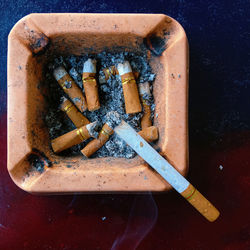 Close-up of cigarette on table