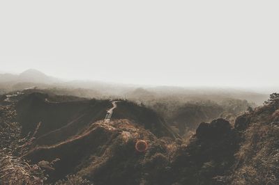 Aerial view of mountains against sky