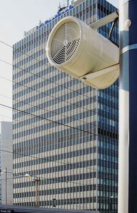 Low angle view of modern building against sky