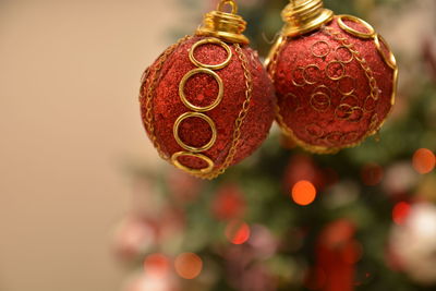 Close-up of christmas decoration hanging against blurred background